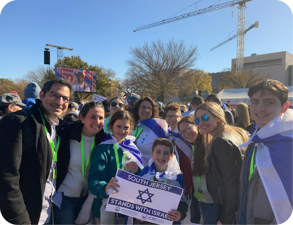 Stand with Israel banner in a crowd